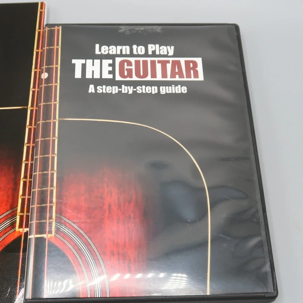 Learn to Play the Guitar Book with‎ Dvd Comprehensive With Illustration